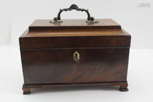 A 19TH CENTURY MAHOGANY TEA CADDY, having hinged lid with decorative brass handle, opening to reveal