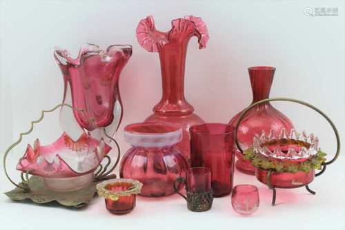 A QUANTITY OF CRANBERRY GLASSWARES, to include; a fluted rim vase 26cm high, an amorphous form