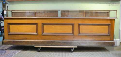 A LATE 19TH / EARLY 20TH CENTURY TWO-PART HABERDASHER'S DISPLAY CABINET, the glazed oak upper