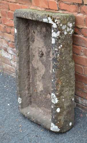 A BELIEVED COTSWOLD STONE RECTANGULAR SHALLOW SINK / PLANTER, having well-weathered exterior, 21cm x