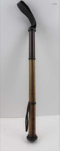 A LATE 19TH CENTURY GENTLEMAN'S LIFE PRESERVER, disguised as a cane shafted leather bound riding