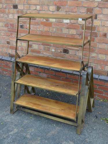 A SET OF INDUSTRIAL CHIC METAL FRAMED ADJUSTABLE SHELVES, with wooden inserts, the whole being