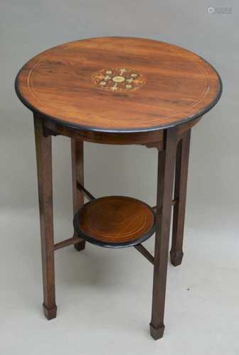 A 19TH CENTURY INLAID MAHOGANY FINISHED CIRCULAR TOPPED TABLE, on four plain legs, united by a