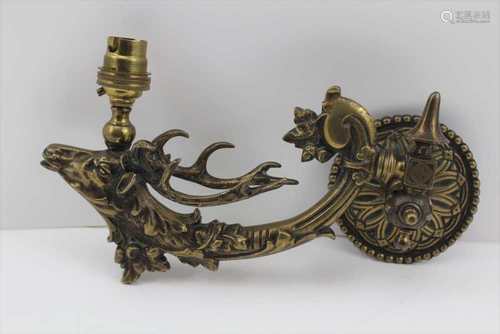 A 19TH CENTURY CAST BRASS GAS LIGHT FITTING, of stag mask design (later electric light fitting),