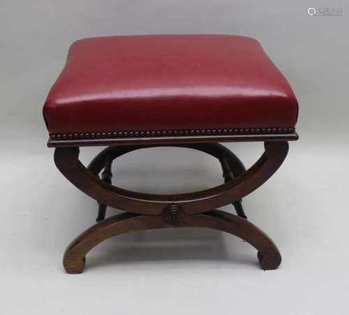 A 19TH CENTURY MAHOGANY FRAMED FOOT STOOL, with claret leather upholstered pad top, with