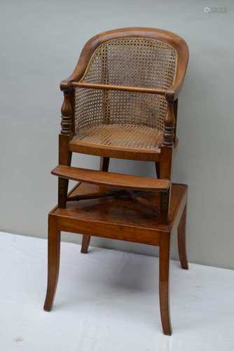 A 19TH CENTURY MAHOGANY CHILD'S BERGERE CHAIR, with adjustable foot rest, mounted on associated