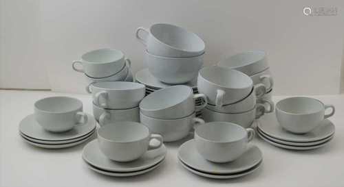 A COLLECTION OF ROYAL COPENHAGEN FAJANCE PLAIN CUPS & SAUCERS of three sizes; eight small cups,