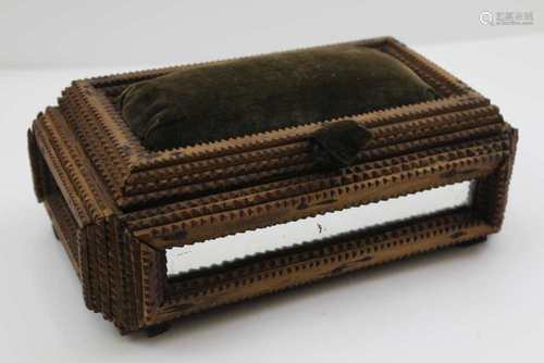 A TRAMP WARE BOX, hinged pin cushion inset lid, mirror inset panels. the lid opening to reveal two