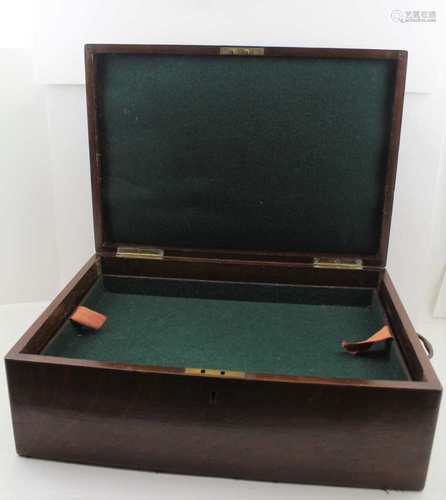 A LATE 19TH CENTURY OAK BOX, the hinged cover with brass engraved crest, fitted side carrying