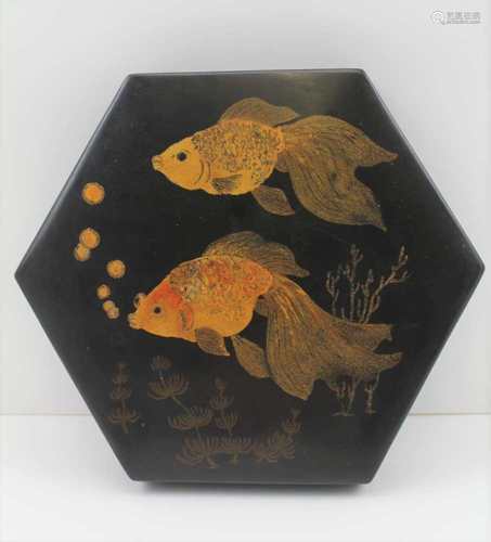 A JAPANESE LACQUER BOX, of hexagonal form, the cover decorated with goldfish on a black ground,