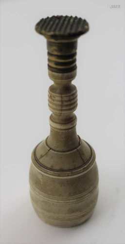 A 19TH CENTURY PIPE TAMPER, turned bone handle, brass head with chequered face, 10cm high