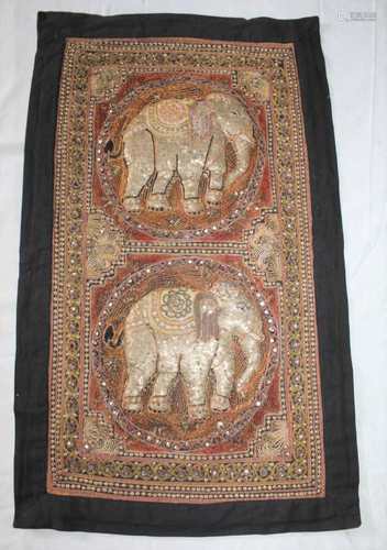 AN UNFRAMED INDIAN NEEDLEWORK PANEL, sewn with beads, sequins and wire work depicting two