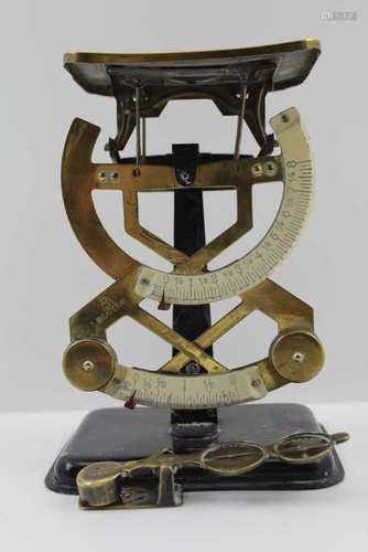 A BILATERAL POSTAL SCALE, brass & tin plate construction, c.1900, 16cm high, together with a