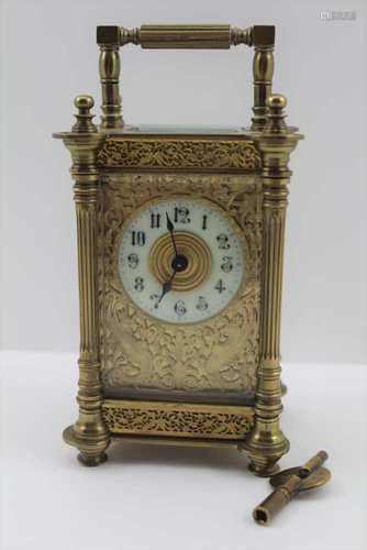 A FRENCH BRASS CASED CARRIAGE CLOCK, c.1900, bevelled glass and pierced decorative panels, including