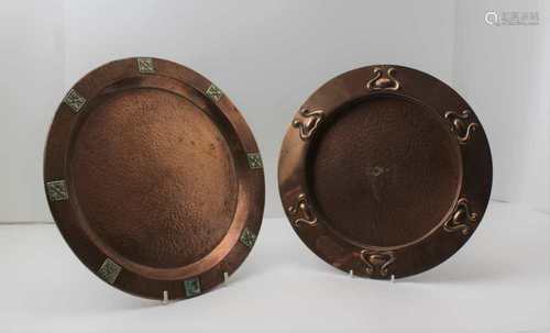 TWO ARTS & CRAFTS COPPER CHARGERS, one has embossed Art Nouveau forms to the rim, 28.5cm in