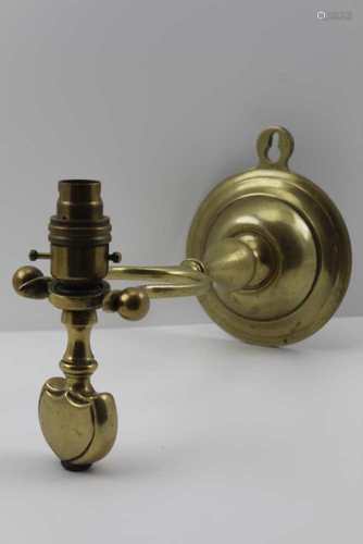 AN EARLY 20TH CENTURY BRASS GIMBAL TYPE LAMP, table or wall mounting, possibly from a pullman