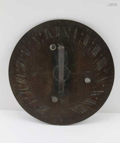 A SMALL BRONZE SUN DIAL PLATE, engraved with Roman numerals and inscribed 