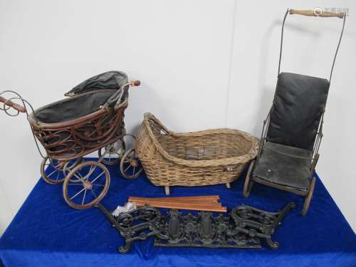 A 19th century dolls push chair, sold together with a wicker dolls basket, dolls pram and a