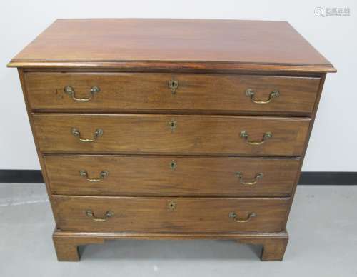 An 18th century George III mahogany chest, of four long graduated oak lined drawers, original