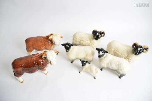 Seven novelty figures of cattle and sheep, to include Coopercraft and Nelson pottery of