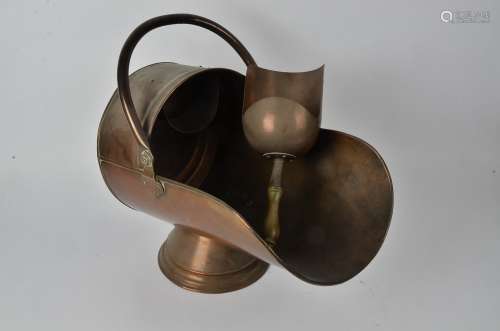 A copper coal scuttle, with associated shovel, height 55cm