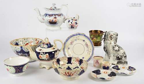 A collection of Gaudy Welsh ceramics, including teapots, bowls and jugs, a Staffordshire style