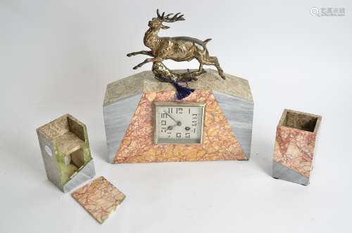 A French Art Deco clock garniture, in red and grey marble, silvered square face with Arabic