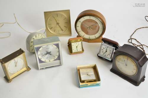Art Deco and Later Desk and Travel Clocks, a group of nine including a Bakelite cased electric