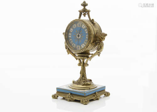 An early 20th century French gilt and porcelain mantle clock, circular case with turquoise porcelain