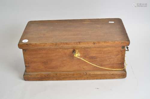 A small pine trunk with brass handles, and lock, 48.5cm x 20cm x 25.5cm