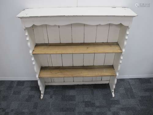 A 20th century oak dresser top, partially painted white, closed back, two fixed shelfs, shaped sides