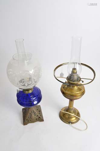 An early 20th Century oil lamp, Duplex, 'Made in England', together with another blue glass
