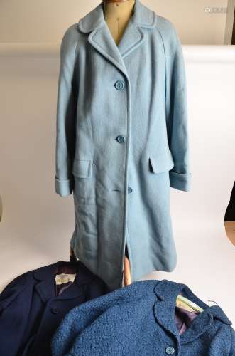 Three vintage Aquascutum wool blend coats, in various shades of blue,
