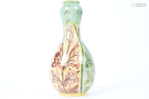 Della Robbia Pottery (Birkenhead 1894-1906), an ovoid bottle vase with alternating patterns of