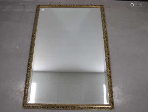 A rectangular gilt framed wall mirror, with bevelled plate, 68cm x 100cm