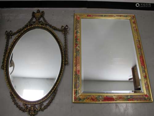 Contemporary wall mirrors, one in the classical style with urn and swag decoration the other