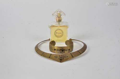 A vintage eau de toilette Mitsouko by Guerlain, appears to contain most of the original perfume,