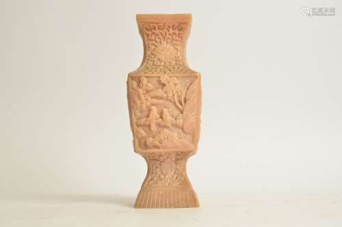 A Chinese soapstone style vase, resin formed, with four panels of figures in rocky landscapes,