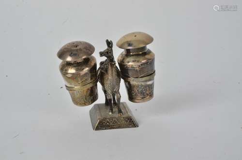 A South American silver cruet set, taking the form of an Llama carrying pots, possibly Peruvian,