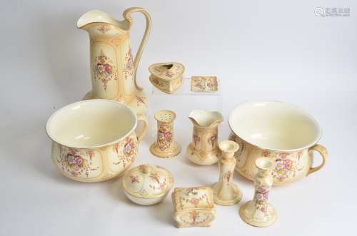 A Royal 'Crown Devon Fielding's 'Spring' pattern dressing table set, to include two chamber pots,