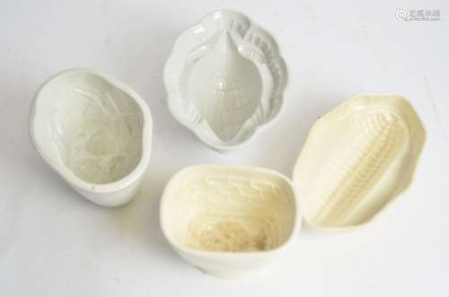 A collection of predominantly 19th Century pottery jelly moulds, having a Wedgwood example with