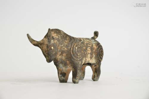 An Eastern tomb figure of a bull, 7cm x 14cm