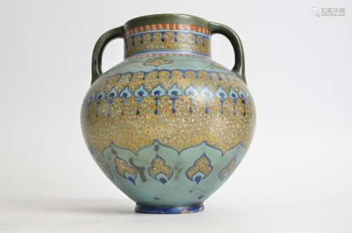 A Gouda pottery twin handled vase, retailed through Liberty of London, height 20cm (a/f)