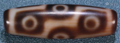 A TIBETAN NINE EYE PATTERN DZI