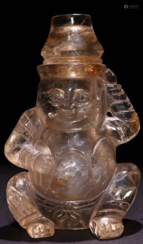 A CRYSTAL CARVED FIGURE SHAPED CONTAINER