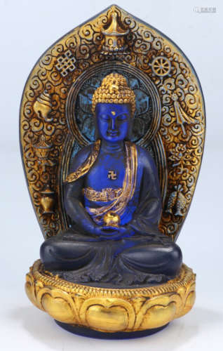 A GLASS SAKYAMUNI BUDDHA STATUE