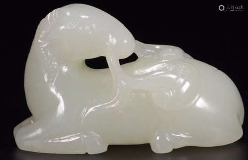 A HETIAN JADE CARVED GOAT SHAPED PENDANT