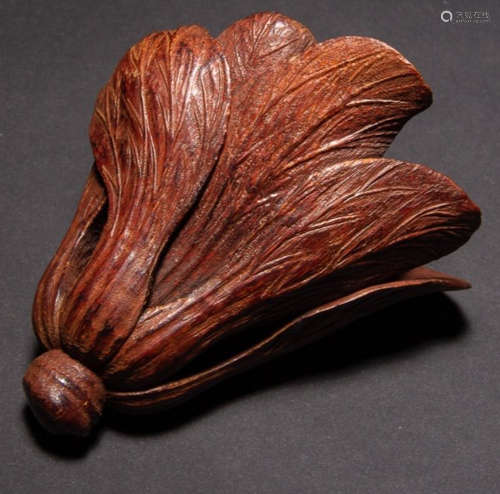 A BAMBOO CARVED PENDANT