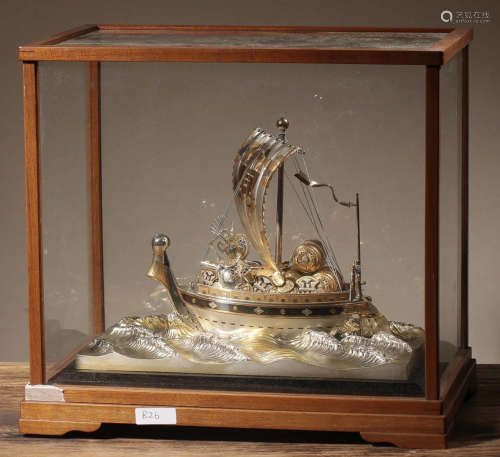 A GILT SILVER CASTED SHIP SHAPED ORNAMENT