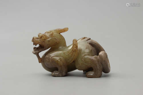 A Chinese Carved Hetian Jade Beast Ornament